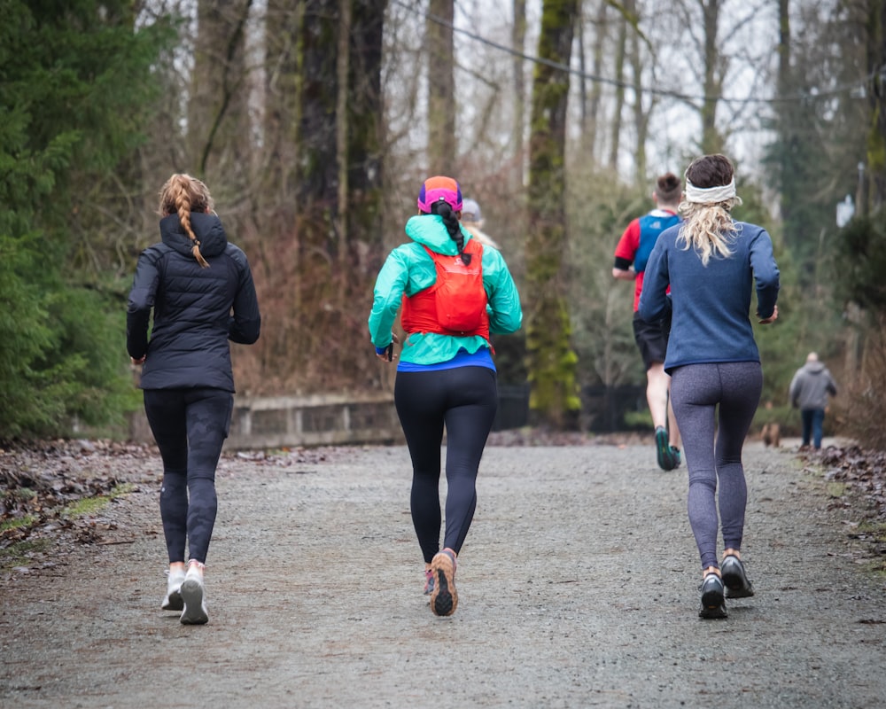 Female runners stretching and preparing for training