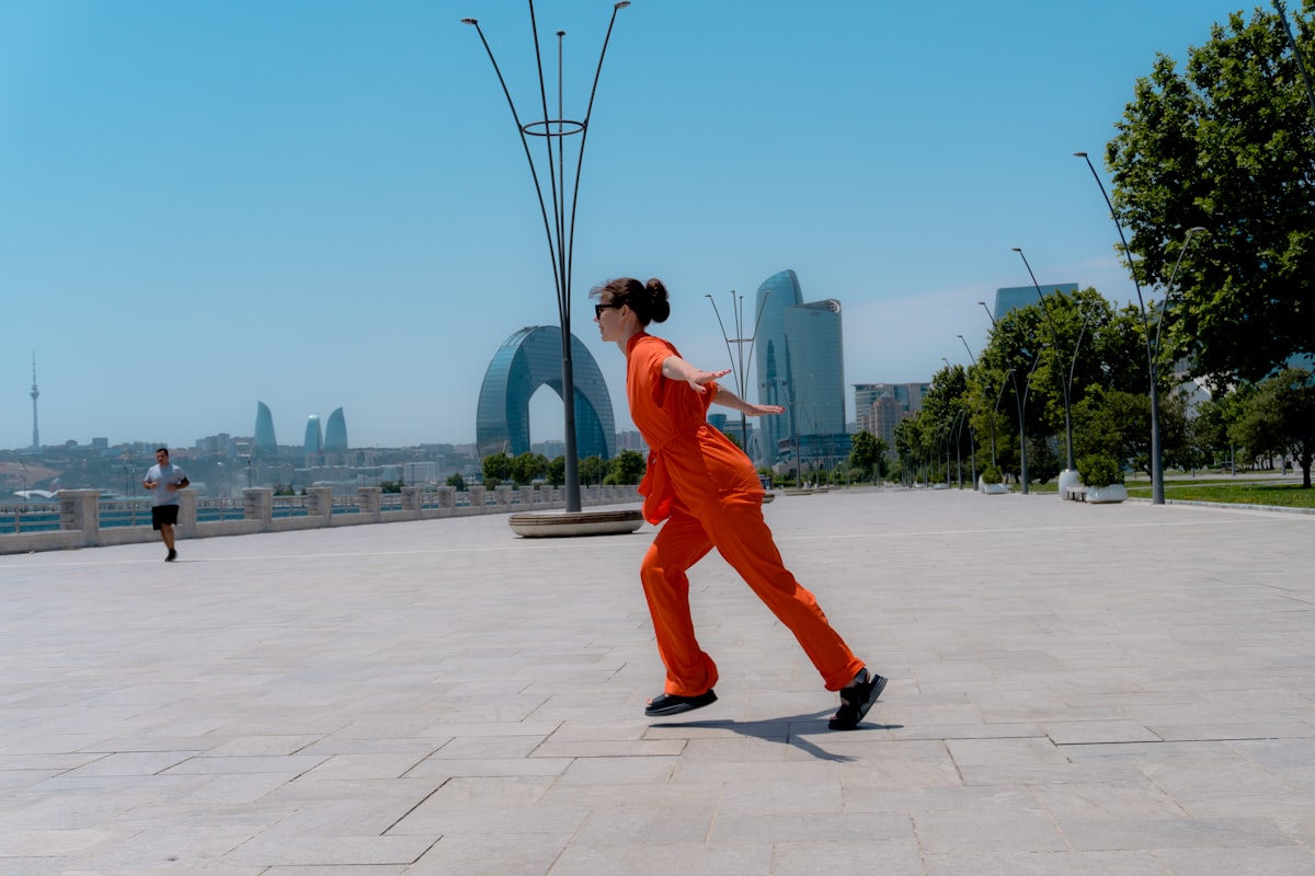 Female athlete stretching and warming up outdoors